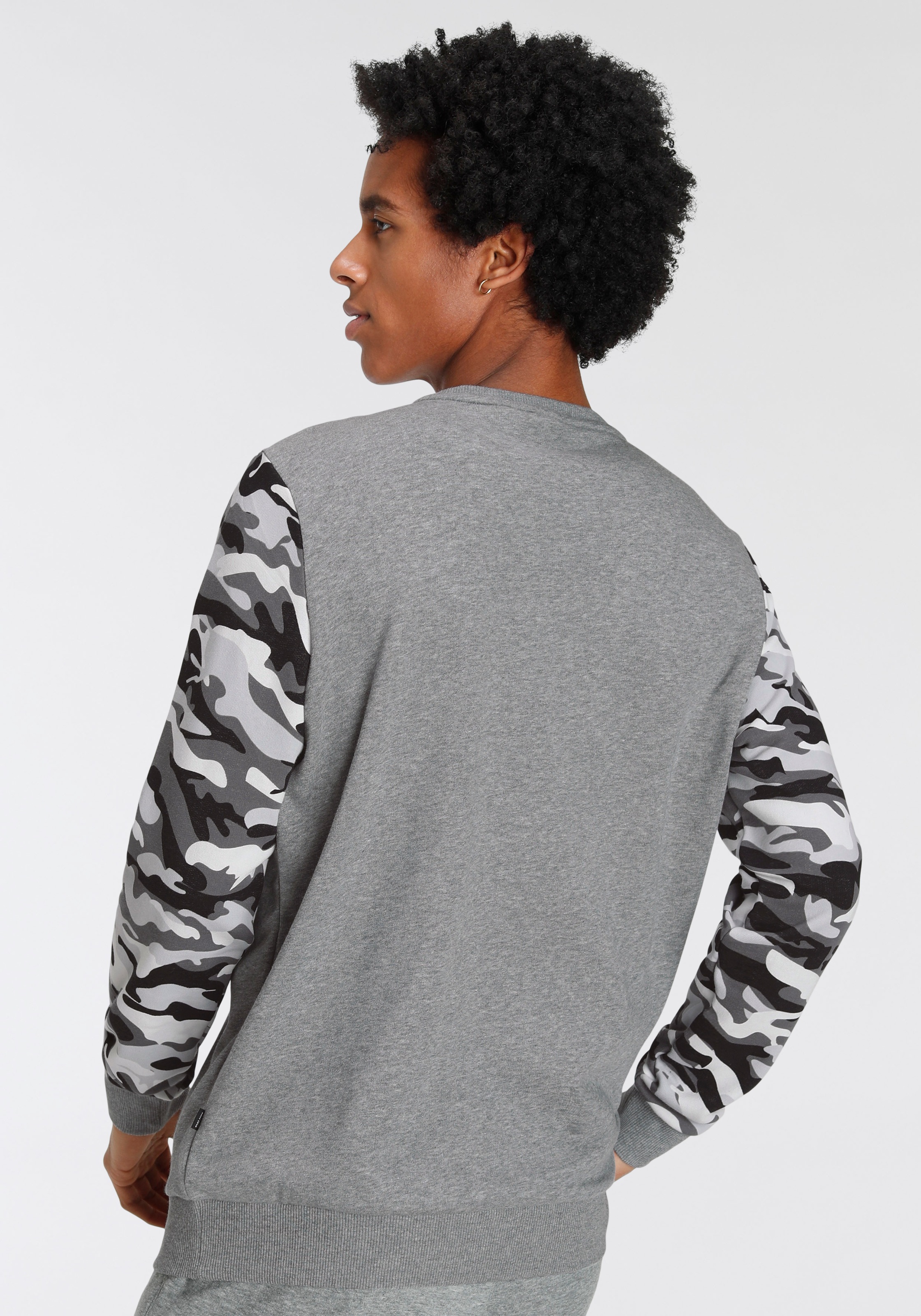 PUMA Sweatshirt »ESS+ Camo Crew TR«
