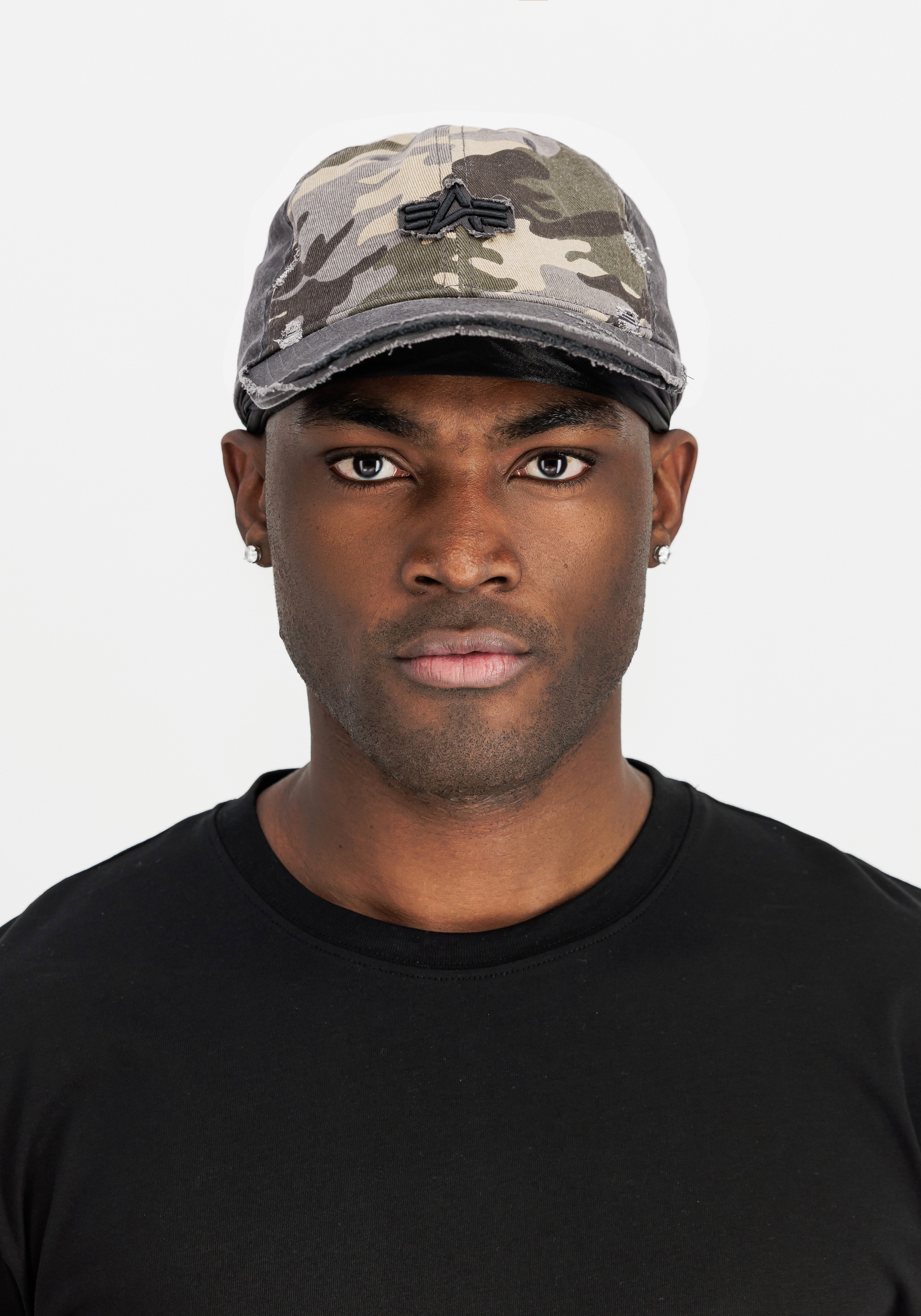 Thumbnail - Alpha Industries Trucker Cap "Distressed Logo Camo Cap"