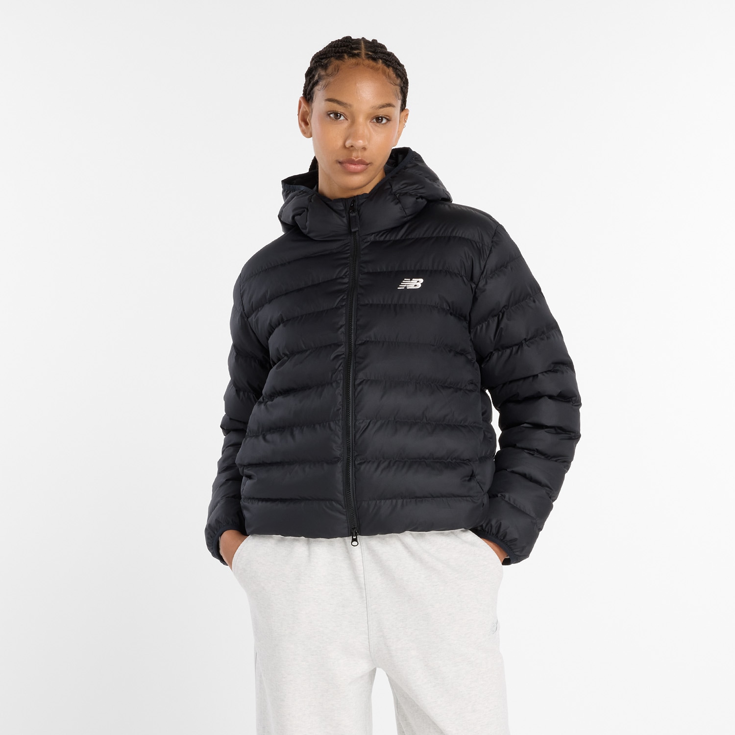 New Balance Winterjacke "Puffer Jacket BLACK" mit Kapuze mit 2-Wege-Reißverschluss