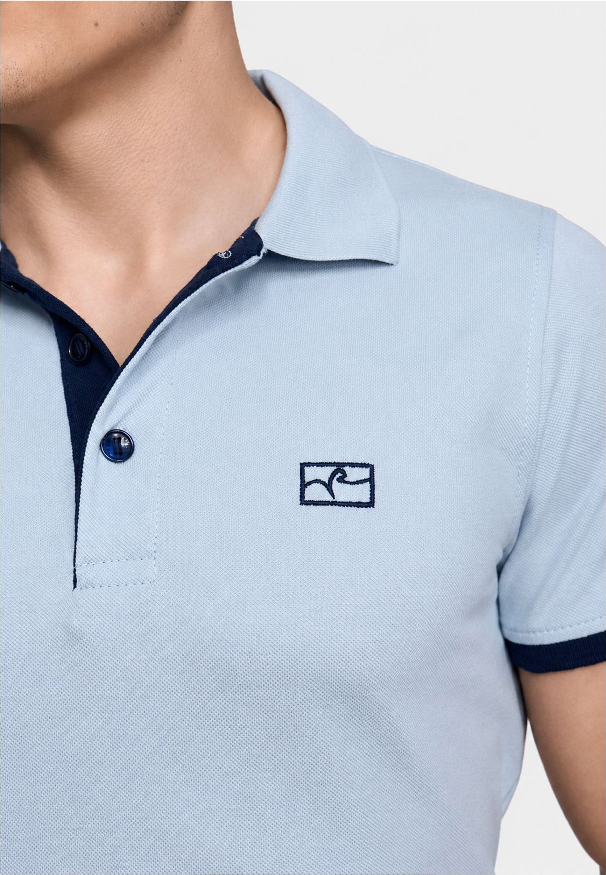 Rusty Neal Poloshirt »Rusty Neal Polo« mit kontrastfarbig abgesetzter Knopfleiste