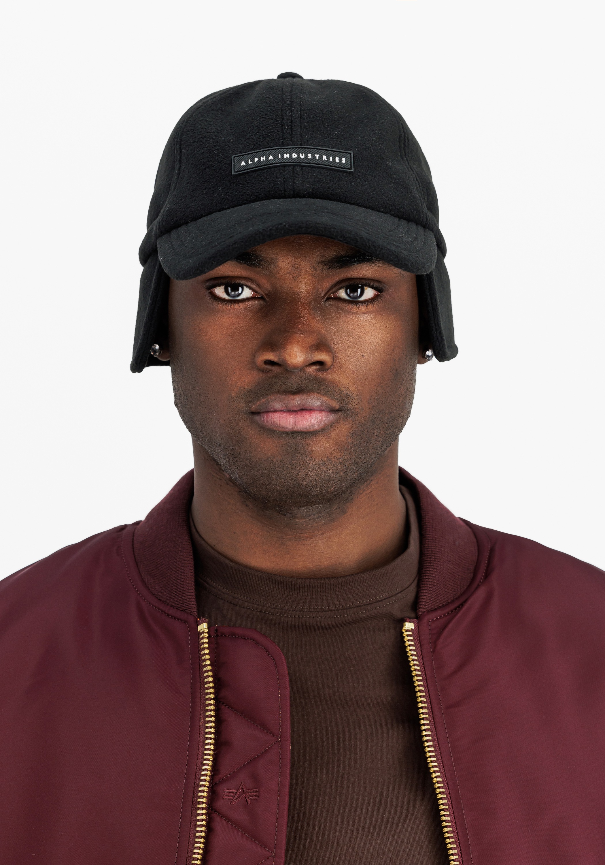 Thumbnail - Alpha Industries Trucker Cap "Snow Cap Rubber Logo"